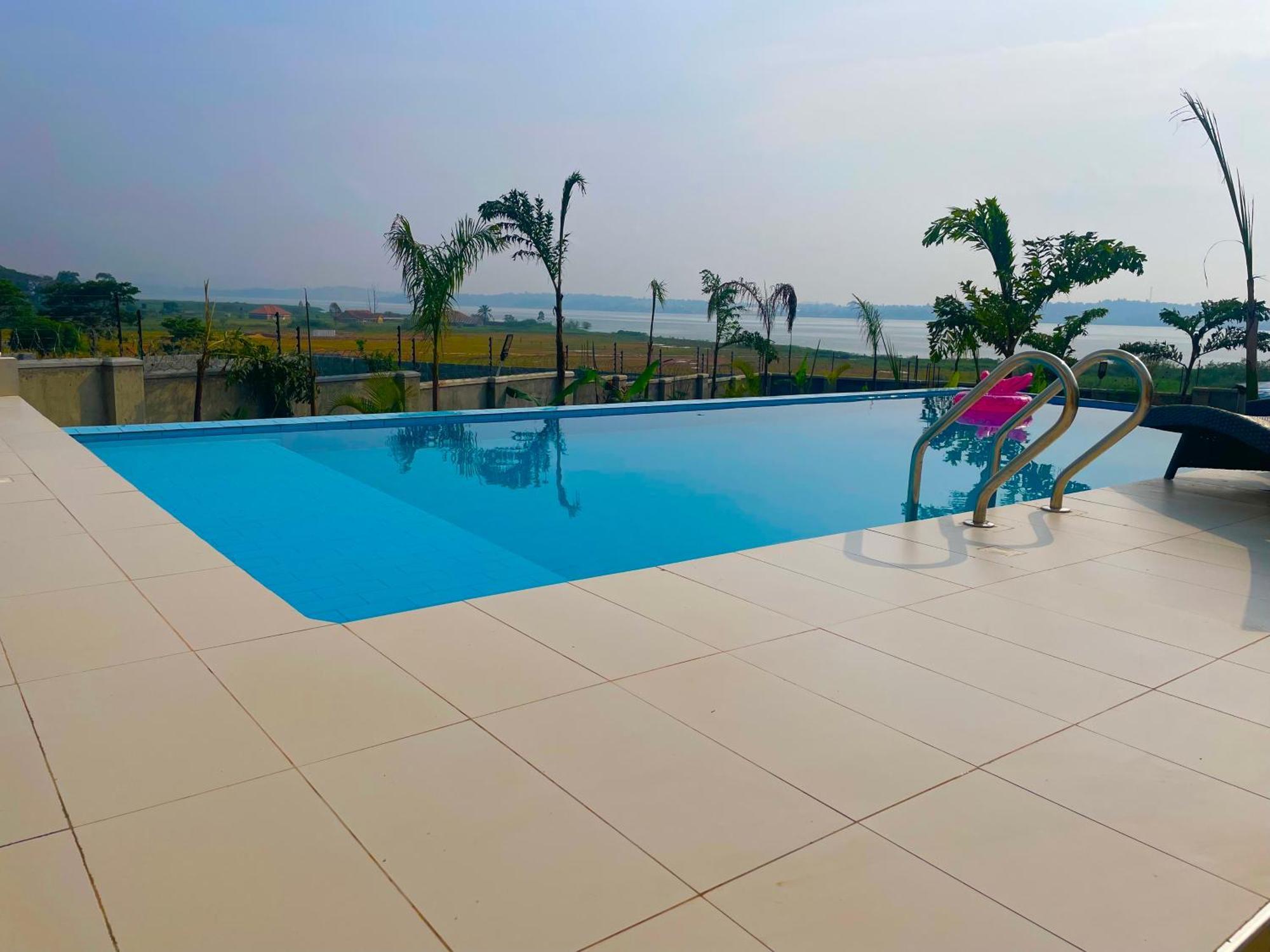 Infinity Pool , Free Private Pool Airport Shuttle Apartment Entebbe